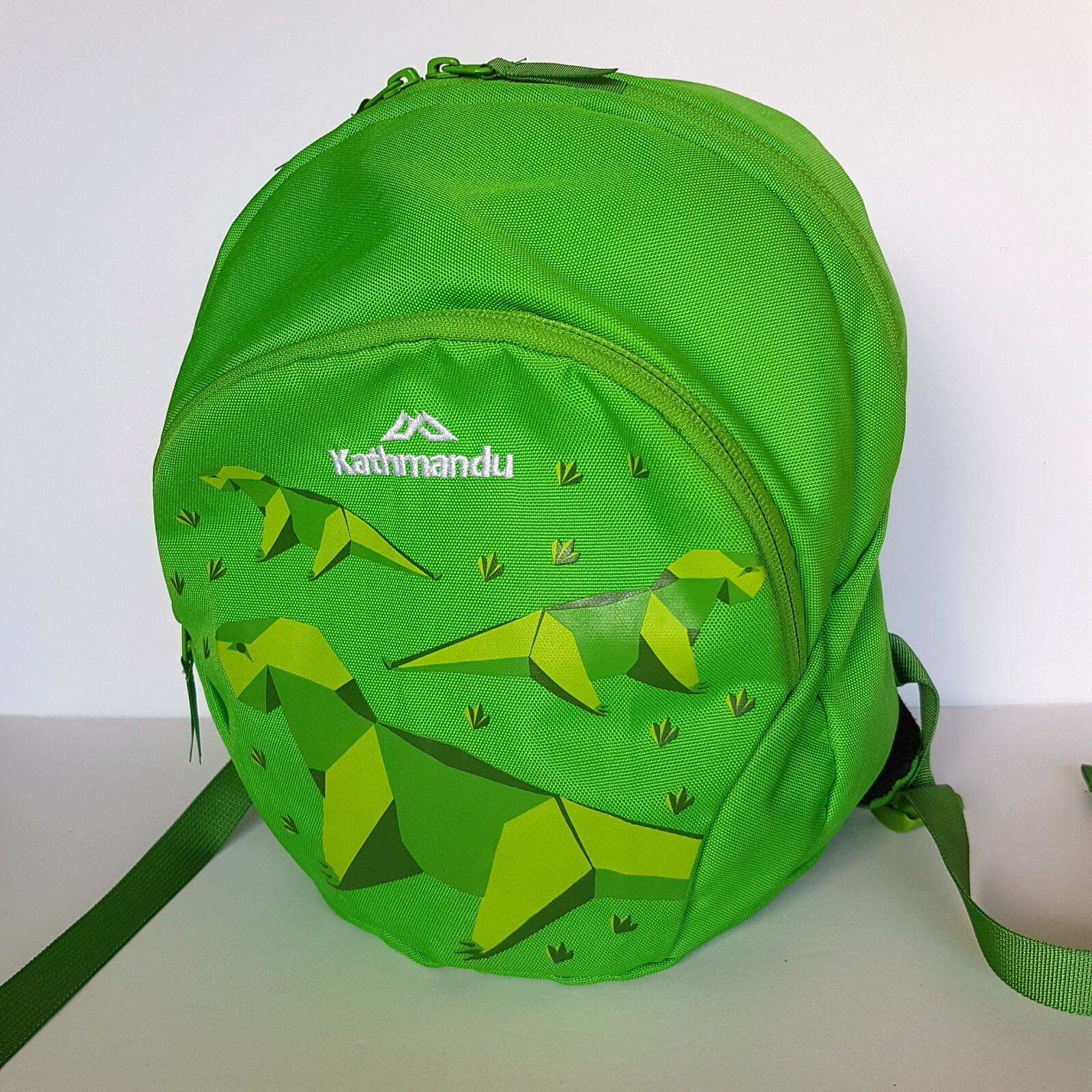 Kathmandu Kids SKIPPET BACKPACK Bag 8L Green Dinosaur Kids Boys School Bag Neon0